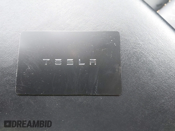 2019 Tesla Model 3 Mid Range with VIN 5YJ3E1EA2KF395549, listed as a IAAI auction lot 41895977 with 97,108 mi miles and . Bid and sale history available at carsss.com. Image 11.