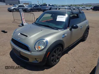 2010 MINI Hardtop S with VIN WMWMF7C50ATZ71187, listed as a IAAI auction lot 42440637 with 82,595 mi miles and . Bid and sale history available at DreamBid. Image 2.