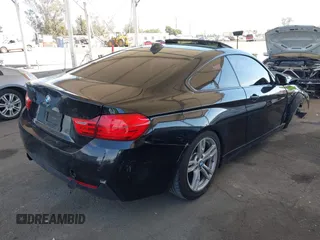 2014 BMW 4 Series 428i with VIN WBA3N7C51EK220125, listed as a IAAI auction lot 41881928 with 129,810 mi miles and . Bid and sale history available at carsss.com. Image 4.