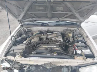 1997 Toyota 4Runner Limited with VIN JT3GN87R2V0024833, listed as a IAAI auction lot 41881359 with 179,115 mi miles. Bid and sale history available at carsss.com. Image 10.