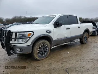 2017 Nissan Titan Pro-4X with VIN 1N6AA1E5XHN570269, listed as a Copart auction lot 40230614 with 172,944 mi miles and Salvage title. Bid and sale history available at DreamBid. Image 1.