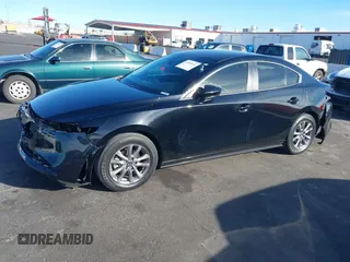 2021 Mazda 3 S z VIN JM1BPAAL8M1321402, wystawiony jako IAAI lot #41693911 z przebiegiem 35 144 mil mil oraz . Historia ofert i sprzedaży dostępna na DreamBid. Obrazek 19.