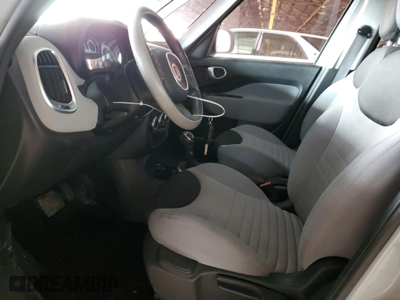 2014 FIAT 500L Easy с VIN ZFBCFABH6EZ024863, выставлен на аукционе Copart как лот 65282035 с пробегом 99 407 миль миль и Чистый • Clean title. История ставок и продаж доступна на DreamBid. Изображение 7.