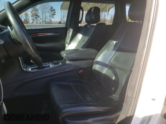 2016 Jeep Grand Cherokee High Altitude with VIN 1C4RJFCG5GC370627, listed as a Copart auction lot 89184435 with 112,989 mi miles and Salvage Title. Bid and sale history available at carsss.com. Image 7.