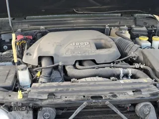 2021 Jeep Wrangler Unlimited Willys with VIN 1C4HJXDM0MW655574, listed as a Copart auction lot 82288524 with 34,986 mi miles and Salvage title. Bid and sale history available at DreamBid. Image 12.
