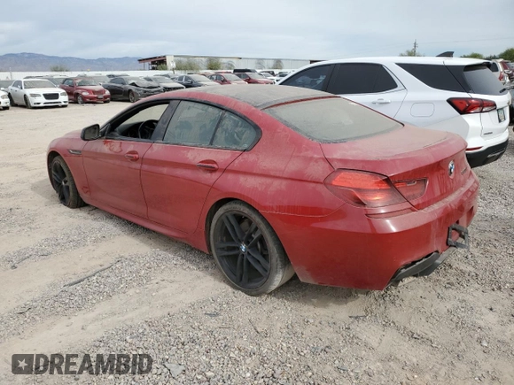 2013 BMW 6 Series 650i with VIN WBA6B2C50DDG66703, listed as a Copart auction lot 82225824 with 199,076 mi miles and Salvage Title. Bid and sale history available at DreamBid. Image 2.