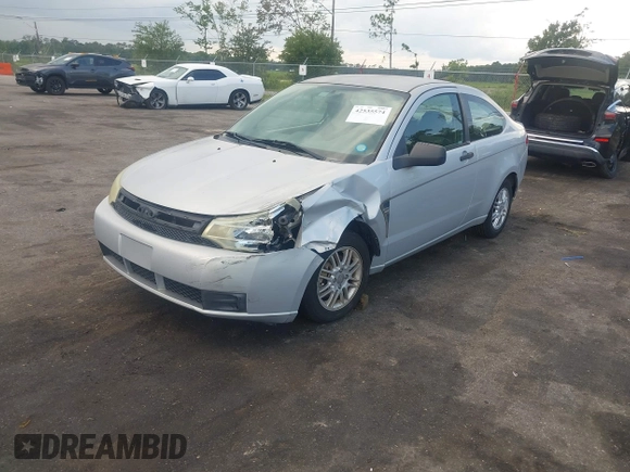 2008 Ford Focus SE with VIN 1FAHP33N58W121614, listed as a IAAI auction lot 42535574 with 156,624 mi miles and . Bid and sale history available at DreamBid. Image 17.