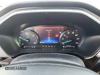 2021 Ford Escape SE Hybrid z VIN 1FMCU9BZ3MUA52900, wystawiony jako IAAI lot #42246611 z przebiegiem 68 765 mil mil oraz . Historia ofert i sprzedaży dostępna na DreamBid. Obrazek 1.