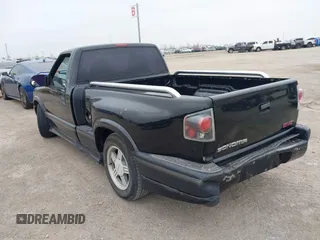 1999 GMC Sonoma with VIN 1GTCS1448X8529251, listed as a IAAI auction lot 41493556 with 291,159 mi miles and . Bid and sale history available at DreamBid. Image 3.