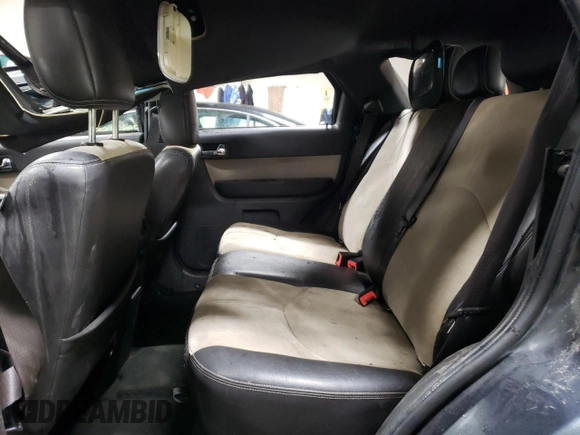 2010 Mercury Mariner Premier z VIN 4M2CN8H70AKJ18368, wystawiony jako Copart lot #85695854 z przebiegiem 183 194 mil mil oraz Nie do naprawy • Non repairable. Historia ofert i sprzedaży dostępna na DreamBid. Obrazek 10.
