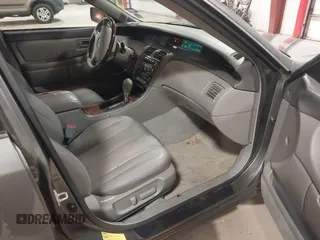 2004 Toyota Avalon XL z VIN 4T1BF28B64U389214, wystawiony jako IAAI lot #42131695 z przebiegiem 187 352 mil mil oraz . Historia ofert i sprzedaży dostępna na DreamBid. Obrazek 5.