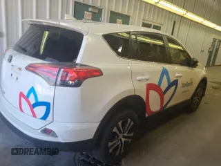 2018 Toyota RAV4 LE with VIN JTMBFREV0JJ183685, listed as a IAAI auction lot 42774230 with 81,554 mi miles and . Bid and sale history available at DreamBid. Image 23.