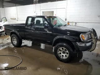 1998 Nissan Frontier with VIN 1N6DD26YXWC317075, listed as a Copart auction lot 85373104 with 200,153 mi miles and Clean title. Bid and sale history available at DreamBid. Image 4.