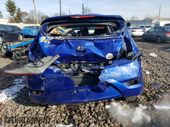 2012 Hyundai Accent SE with VIN KMHCU5AEXCU025845, listed as a Copart auction lot 86557364 with 117,262 mi miles and Salvage Title. Bid and sale history available at carsss.com. Image 6.