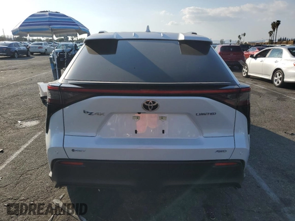 2024 Toyota bZ4X XLE with VIN JTMABACA6RA065029, listed as a Copart auction lot 43008655 with 15,489 mi miles and Salvage Title. Bid and sale history available at DreamBid. Image 6.