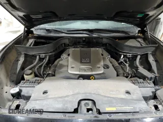 2014 Infiniti QX70 z VIN JN8CS1MW0EM411494, wystawiony jako Copart lot #55810625 z przebiegiem 94 258 mil mil oraz Szkody całkowita. Historia ofert i sprzedaży dostępna na DreamBid. Obrazek 12.