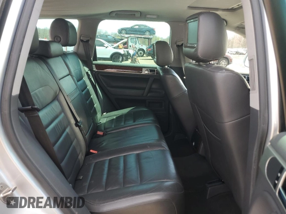 2010 Volkswagen Touareg VR6 with VIN WVGBF7A97AD004355, listed as a Copart auction lot 52861335 with 129,454 mi miles and Salvage Title. Bid and sale history available at DreamBid. Image 10.