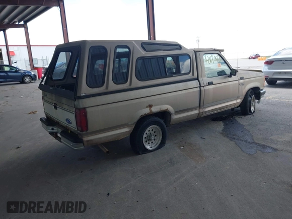 1992 Ford Ranger XLT with VIN 1FTCR10X5NUA12182, listed as a IAAI auction lot 42623003 with Not provided miles and . Bid and sale history available at DreamBid. Image 4.