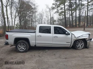 2017 GMC Sierra 1500 SLT z VIN 3GTU2NECXHG496153, wystawiony jako IAAI lot #41787068 z przebiegiem 115 091 mil mil oraz . Historia ofert i sprzedaży dostępna na DreamBid. Obrazek 13.