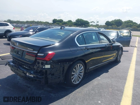 2022 BMW 7 Series 740i with VIN WBA7T2C02NCH73426, listed as a IAAI auction lot 42641007 with 49,300 mi miles and . Bid and sale history available at DreamBid. Image 4.