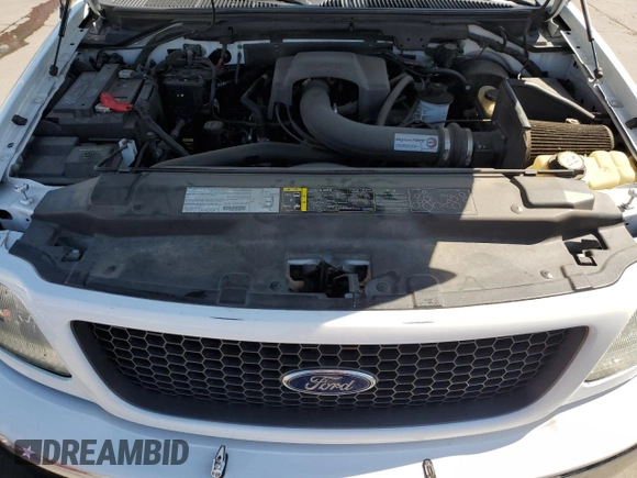 2003 Ford F-150 XL with VIN 1FTRX18L63NA76059, listed as a Copart auction lot 60846555 with 57,346 mi miles and Salvage title. Bid and sale history available at DreamBid. Image 11.