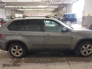 2009 BMW X5 30i with VIN 5UXFE43559L272922, listed as a IAAI auction lot 41723504 with 210,793 mi miles. Bid and sale history available at carsss.com. Image 13.
