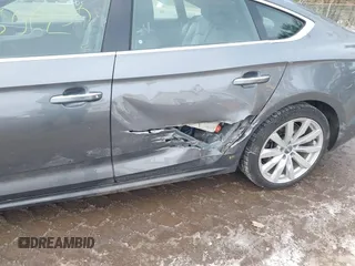 2018 Audi A5 Sportback Premium Plus z VIN WAUBNCF52JA124956, wystawiony jako IAAI lot #41606230 z przebiegiem 100 067 mil mil oraz . Historia ofert i sprzedaży dostępna na DreamBid. Obrazek 6.