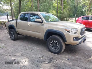 2019 Toyota Tacoma SR with VIN 3TMCZ5AN8KM228192, listed as a IAAI auction lot 42606105 with 102,306 mi miles and . Bid and sale history available at DreamBid. Image 1.