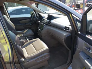 2015 Honda Odyssey EX-L z VIN 5FNRL5H61FB126947, wystawiony jako IAAI lot #42165599 z przebiegiem 213 058 mil mil oraz . Historia ofert i sprzedaży dostępna na DreamBid. Obrazek 5.