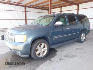 2009 Chevrolet Suburban LTZ with VIN 1GNFC36J29R293712, listed as a IAAI auction lot 42577800 with 202,593 mi miles and . Bid and sale history available at DreamBid. Image 17.