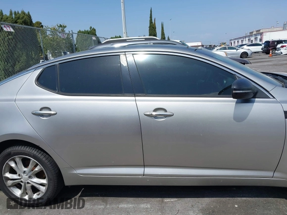 2013 Kia Optima EX z VIN 5XXGN4A70DG148060, wystawiony jako IAAI lot #41900134 z przebiegiem 149 214 mil mil oraz . Historia ofert i sprzedaży dostępna na DreamBid. Obrazek 13.