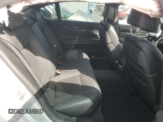 2015 BMW 7 Series 740Li with VIN WBAYE4C52FD947168, listed as a Copart auction lot 71287564 with 103,444 mi miles and Salvage Title. Bid and sale history available at DreamBid. Image 10.