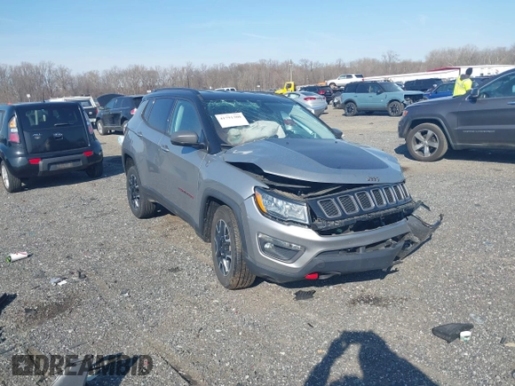 2020 Jeep Compass Trailhawk with VIN 3C4NJDDBXLT106663, listed as a IAAI auction lot 41791300 with 74,162 mi miles and . Bid and sale history available at carsss.com. Image 1.