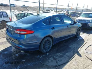 2018 Ford Fusion S with VIN 3FA6P0G77JR129224, listed as a IAAI auction lot 41483648 with 104,045 mi miles. Bid and sale history available at carsss.com. Image 4.