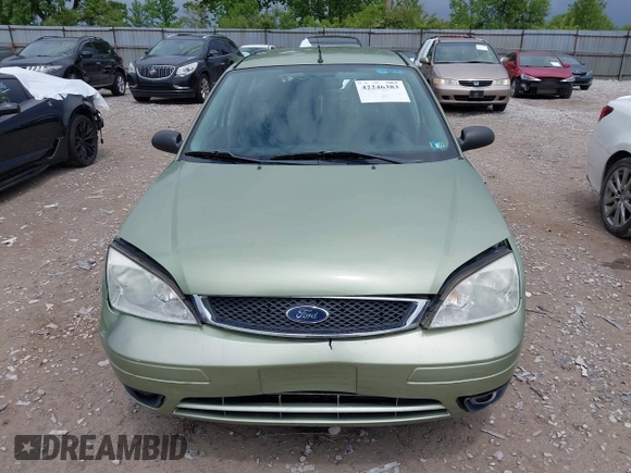 2007 Ford Focus S z VIN 1FAHP37N47W278284, wystawiony jako IAAI lot #42246383 z przebiegiem 164 830 mil mil oraz . Historia ofert i sprzedaży dostępna na DreamBid. Obrazek 13.