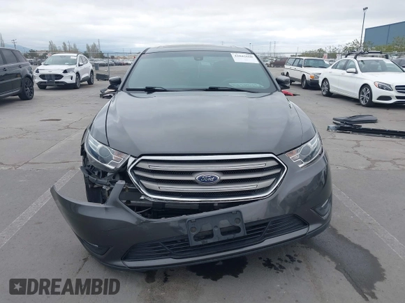 2017 Ford Taurus SEL with VIN 1FAHP2E83HG117296, listed as a IAAI auction lot 42042660 with 119,410 mi miles and . Bid and sale history available at DreamBid. Image 12.