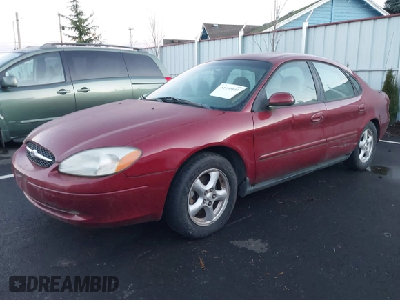 2002 Ford Taurus SE Standard z VIN 1FAFP53U32G242170, wystawiony jako IAAI lot #41299039 z przebiegiem 99 928 mil mil oraz . Historia ofert i sprzedaży dostępna na DreamBid. Obrazek 2.