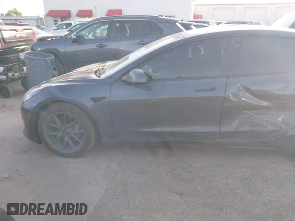 2022 Tesla Model 3 Long Range with VIN 5YJ3E1EB3NF264532, listed as a IAAI auction lot 41842044 with 42,280 mi miles and . Bid and sale history available at DreamBid. Image 13.
