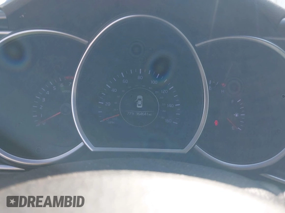 2015 Kia Optima LX with VIN 5XXGM4A77FG381505, listed as a IAAI auction lot 42105568 with 164,641 mi miles and . Bid and sale history available at DreamBid. Image 7.