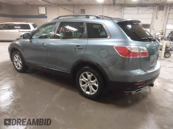 2012 Mazda CX-9 Touring z VIN JM3TB3CV8C0358099, wystawiony jako IAAI lot #41478110 z przebiegiem 151 716 mil mil oraz . Historia ofert i sprzedaży dostępna na DreamBid. Obrazek 3.