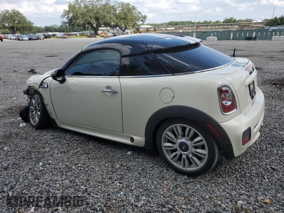 2012 MINI Coupe S z VIN WMWSX3C56CT154872, wystawiony jako Copart lot #68011264 z przebiegiem 91 650 mil mil oraz Szkody całkowita. Historia ofert i sprzedaży dostępna na DreamBid. Obrazek 2.