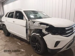 2022 Volkswagen Atlas SE z VIN 1V2KE2CA2NC207116, wystawiony jako IAAI lot #41082650 z przebiegiem 38 018 mil mil oraz . Historia ofert i sprzedaży dostępna na DreamBid. Obrazek 1.