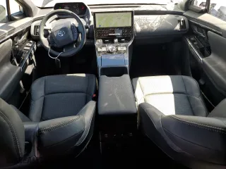2023 Toyota bZ4X XLE with VIN JTMABACA8PA029307, listed as a Copart auction lot 71105754 with 24,208 mi miles and Salvage Title. Bid and sale history available at carsss.com. Image 8.