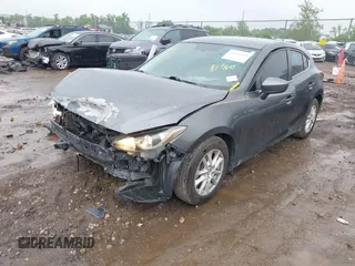 2014 Mazda 3 i Touring z VIN JM1BM1L70E1212930, wystawiony jako IAAI lot #42434348 z przebiegiem 107 209 mil mil oraz . Historia ofert i sprzedaży dostępna na DreamBid. Obrazek 2.
