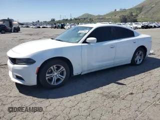 2019 Dodge Charger SXT with VIN 2C3CDXBG0KH658294, listed as a Copart auction lot 52412395 with 221,054 mi miles and Clean Title. Bid and sale history available at carsss.com. Image 1.