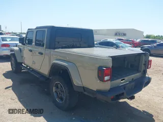 2020 Jeep Gladiator Sport S with VIN 1C6HJTAG1LL173646, listed as a IAAI auction lot 42008807 with Not Provided miles. Bid and sale history available at carsss.com. Image 3.
