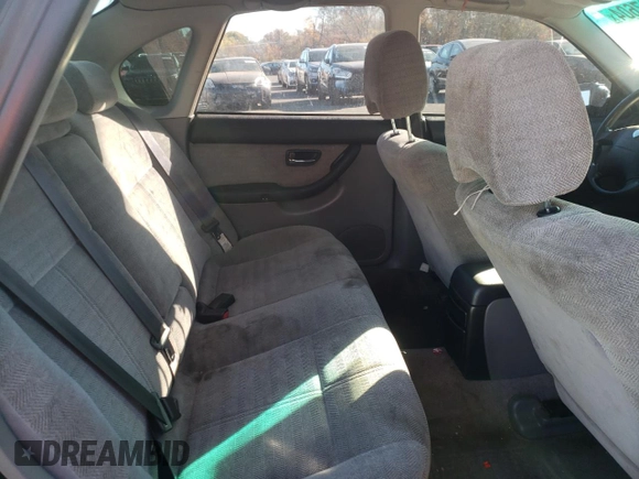 2000 Subaru Legacy L with VIN 4S3BE6352Y6214274, listed as a Copart auction lot 77827604 with 117,520 mi miles and Salvage title. Bid and sale history available at DreamBid. Image 11.