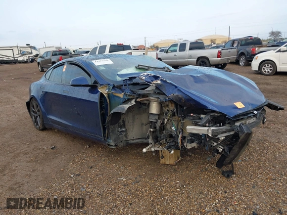 2021 Tesla Model S Long Range with VIN 5YJSA1E50MF432224, listed as a IAAI auction lot 41417130 with Not provided miles and . Bid and sale history available at DreamBid. Image 13.