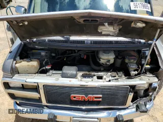 1993 GMC Vandura z VIN 1GDEG25KXPF515257, wystawiony jako Copart lot #56179665 z przebiegiem 308 324 mil mil oraz Szkody całkowita. Historia ofert i sprzedaży dostępna na DreamBid. Obrazek 12.