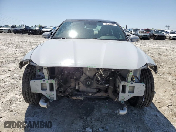 2022 Genesis G70 2.0T z VIN KMTG34TA0NU089619, wystawiony jako Copart lot #52154495 z przebiegiem 70 890 mil mil oraz Szkody całkowita. Historia ofert i sprzedaży dostępna na DreamBid. Obrazek 5.